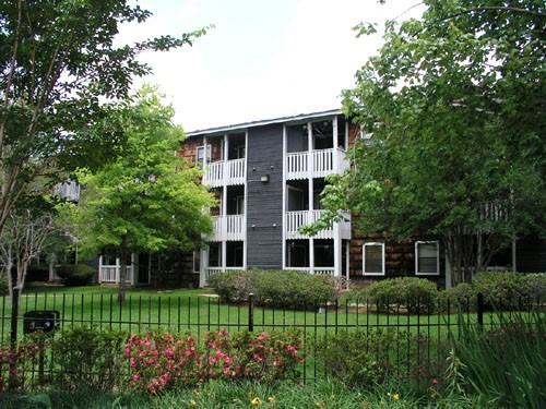 Pier Landing look at backside view of apartment buildings from pool area
